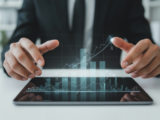 Professional investor analyzing digital financial data and growth opportunities on a tablet, representing unlisted share investment.